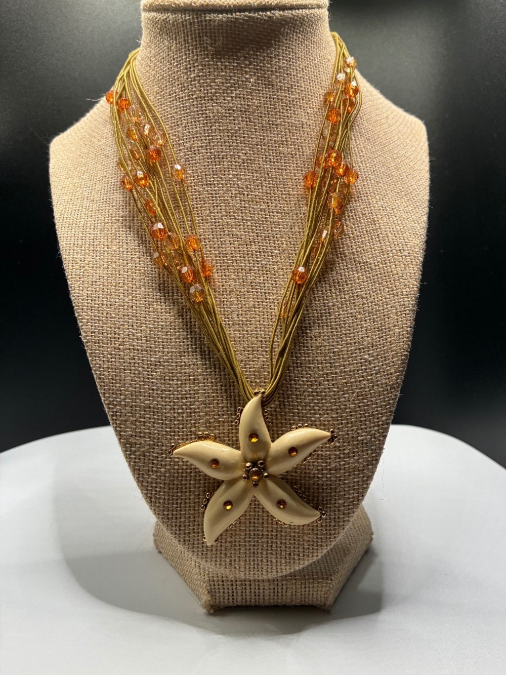 Ivory Enameled Gold-Tone Starfish Pendant with multi-strand Cords with Beads